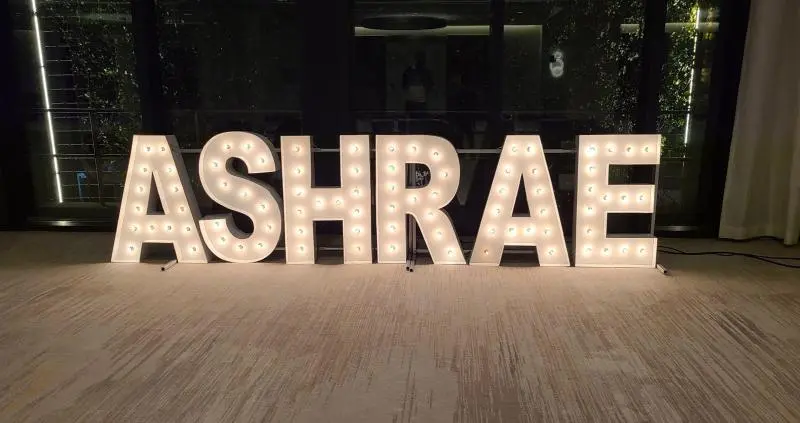 Large letters spelling ASHRAE lit up in lights